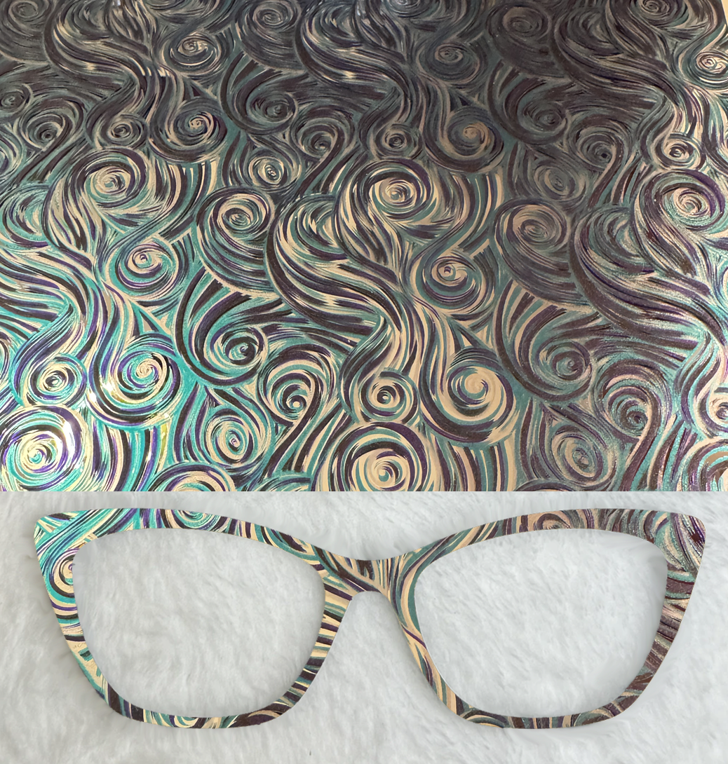 Mirrored Black and Teal Swirls